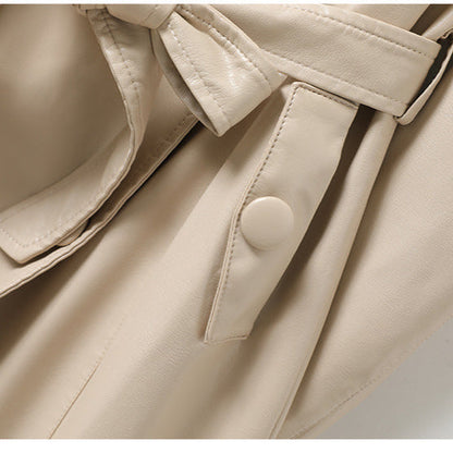 Jack Hafford Chelsea sheepskin leather trench coat hanging on a rack with a classic design and rich leather texture.