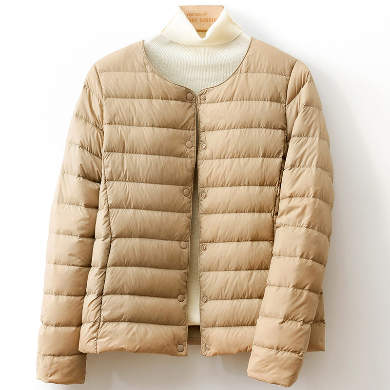 Jack Hafford Helga Down Puff Jacket in black, featuring a quilted design and hood, displayed on a hanger.
