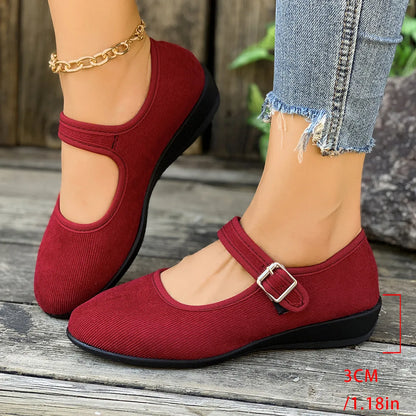 Homixa women's Mary Jane shoes with buckle detail, classic black leather with rounded toe and adjustable strap.