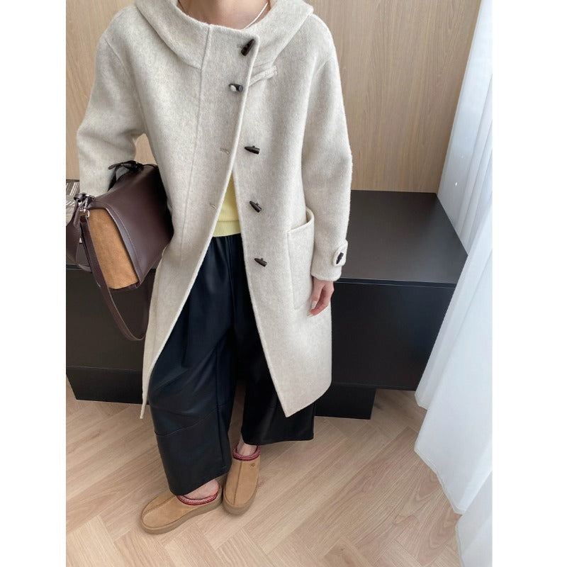 Homixa Women's mid-length hooded toggle coat with relaxed fit, patch pockets, and toggle front, casual overcoat for stylish warmth.