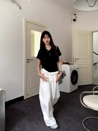 Loppist PAISLEY™ wide-leg jeans with elegant lace trim, showcasing their relaxed fit and stylish design.