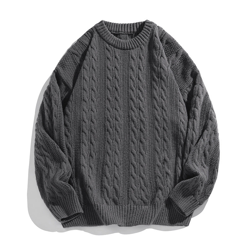 Homixa Arbury cable-knit crew-neck sweater with dropped shoulders, relaxed fit, and ribbed cuffs, displayed on a neutral background.