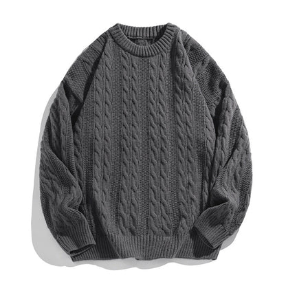 Homixa Arbury cable-knit crew-neck sweater with dropped shoulders, relaxed fit, and ribbed cuffs, displayed on a neutral background.