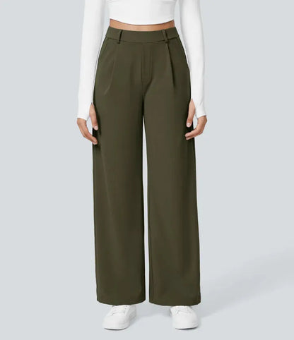 Homixa Anya women's high-waisted wide leg pants with relaxed fit and flowing fabric, shown on a model.