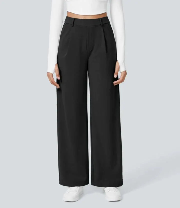 Homixa Anya women's high-waisted wide leg pants with relaxed fit and flowing fabric, shown in a stylish, natural pose.
