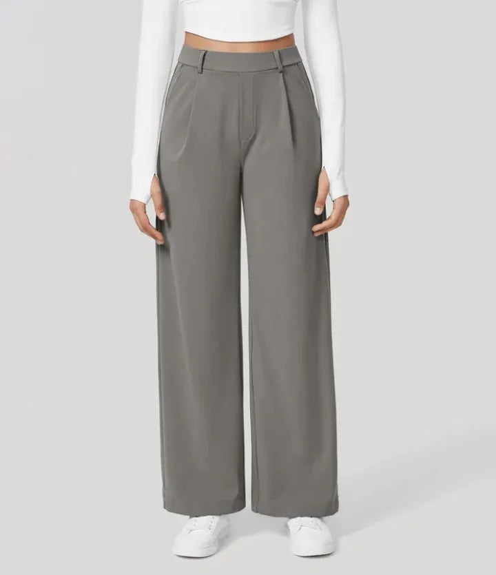 Homixa Anya women's high-waisted wide leg pants with relaxed fit and flowing fabric, shown on a model.