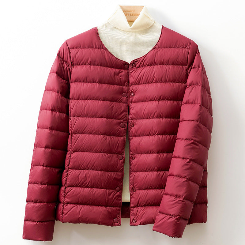 Jack Hafford Helga Down Puff Jacket in black, featuring a quilted design with a high collar and insulated warmth.