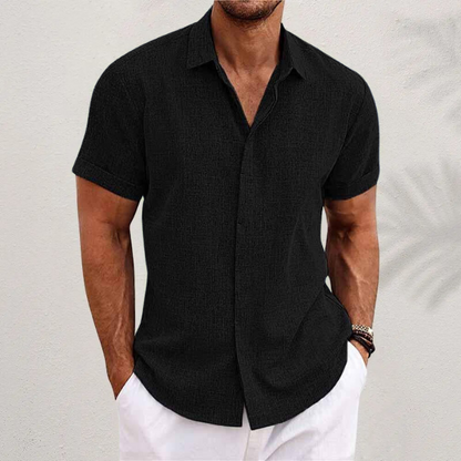 Homixa Caelenza classic short-sleeve collared dress shirt with textured finish and curved hem, displayed on a model.