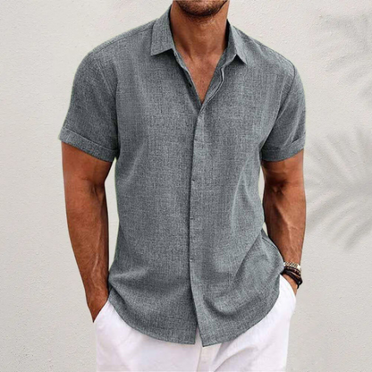 Homixa Caelenza classic short-sleeve collared dress shirt with textured finish and curved hem, visible in the image.