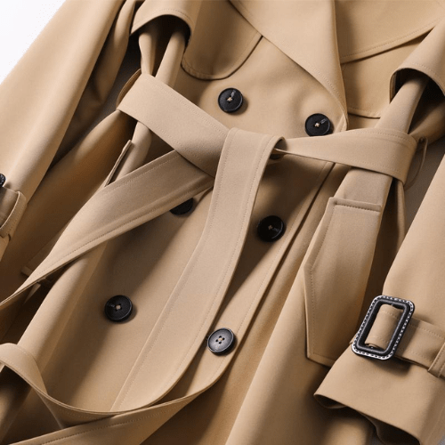 Beckmiller vintage trendy women's trench coat with timeless edge and modern style, shown in a stylish outdoor setting