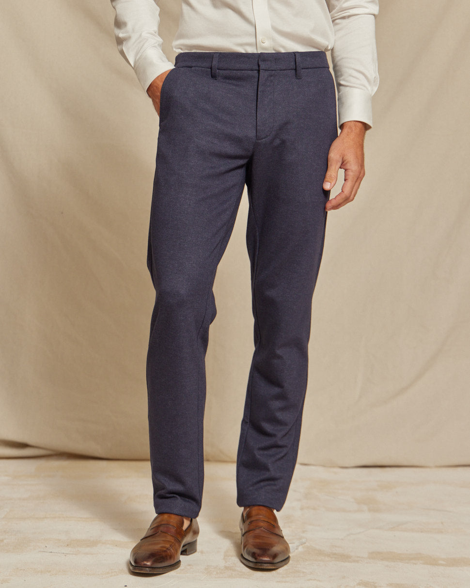 Men's navy blue brushed cotton chino pants by Olive & Evy, slim fit style, shown in a natural relaxed pose.