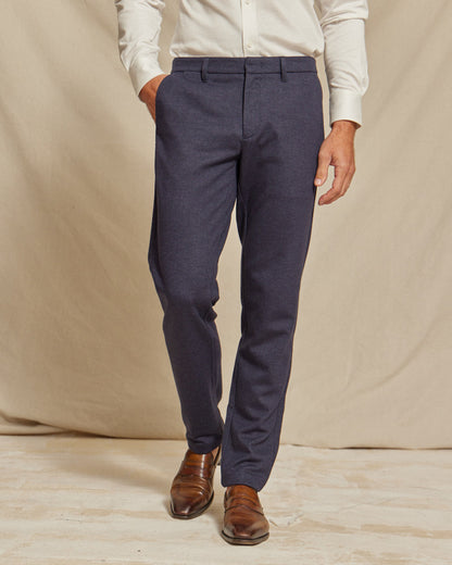 Men's navy blue brushed stretch chino pants by Olive & Evy, slim fit, showing front view with belt loops and tailored fit.
