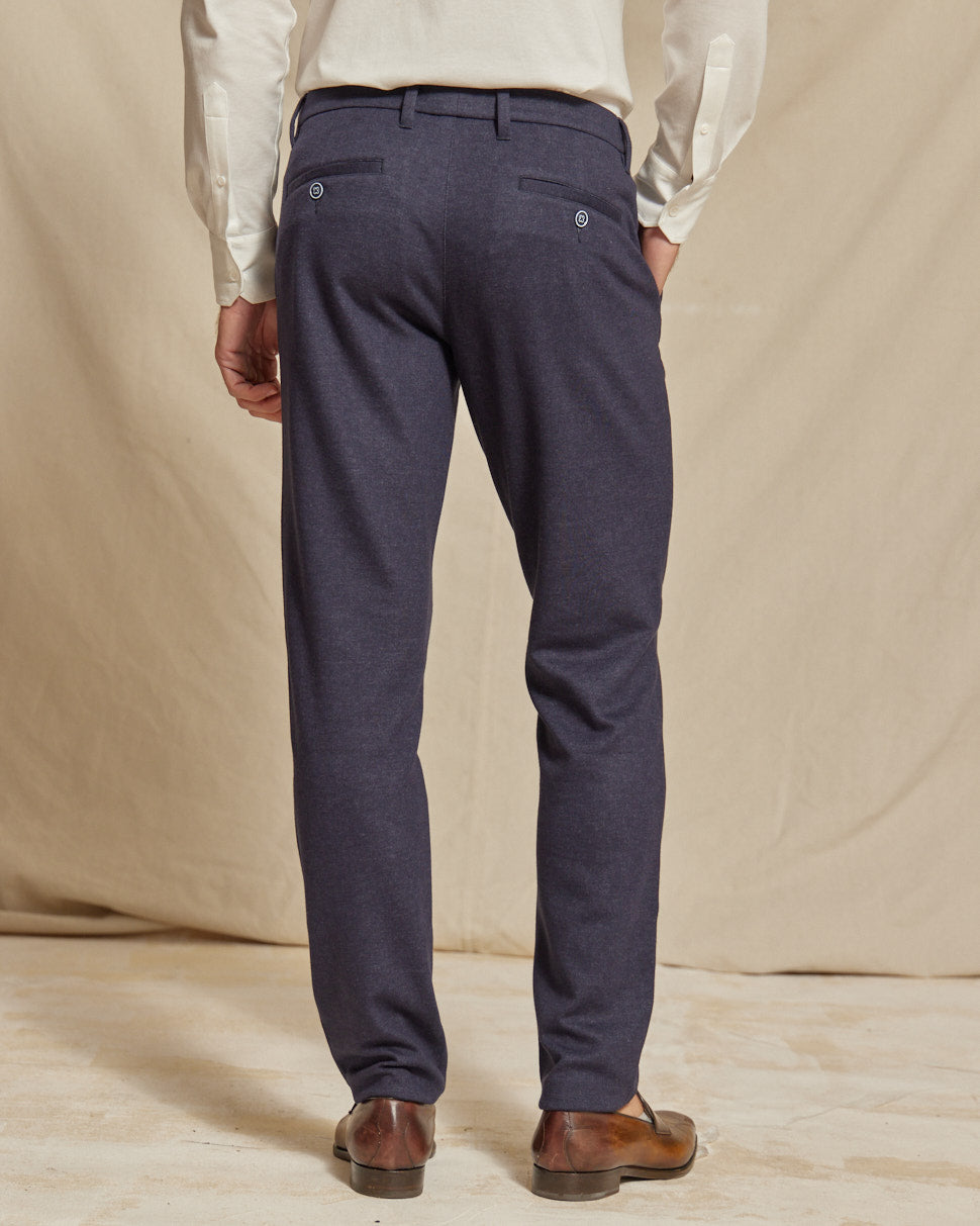 Men's navy blue brushed stretch chino pants by Olive & Evy, slim fit, casual style, shown on a model.