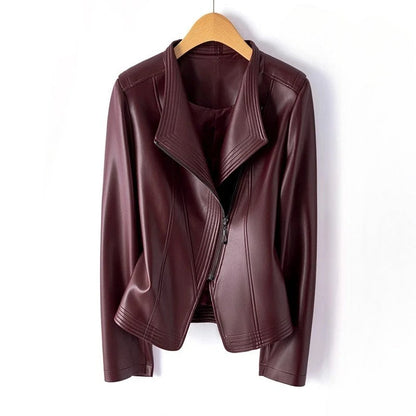 Black Marcella leather jacket by Jack Hafford featuring a sleek design and classic collar, displayed on a hanger.