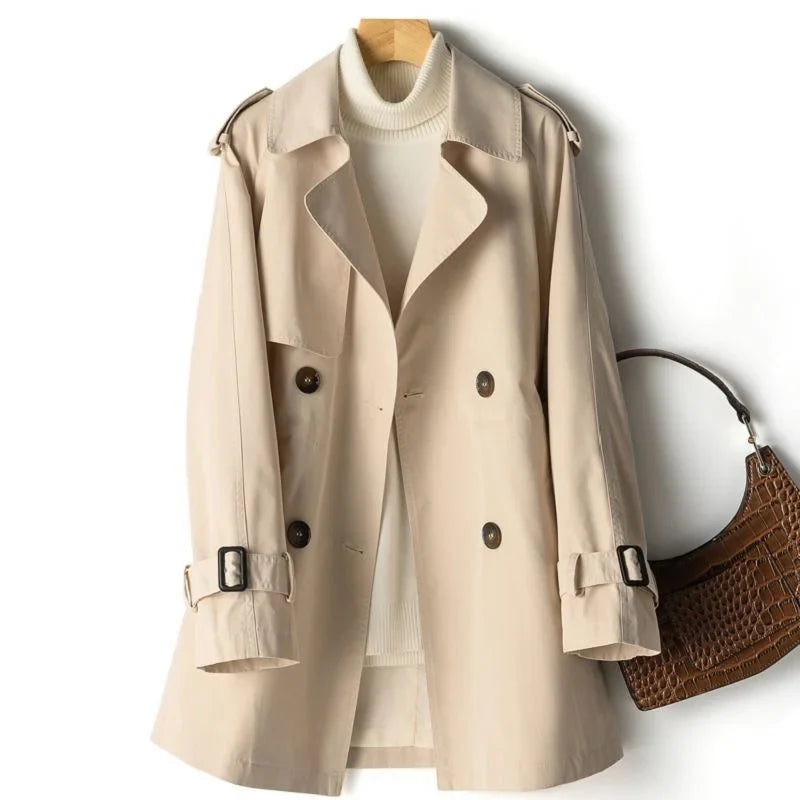 Sweet Emily trench coat by Jack Hafford, beige fabric with classic collar and waist belt, front button closure, stylish and versatile outerwear