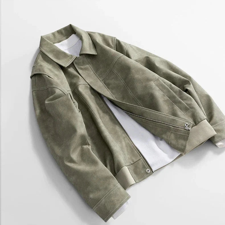 Rothwell leather jacket by Jack Hafford displayed on a hanger, showcasing its classic brown leather and stylish design.