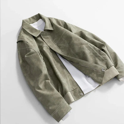 Rothwell leather jacket by Jack Hafford displayed on a hanger, showcasing its classic brown leather and stylish design.