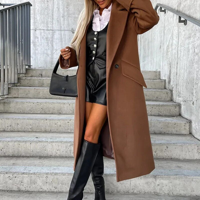 Women's trench coat by Homixa, stylish layering piece with classic design and neutral color, perfect for fall and winter wear.
