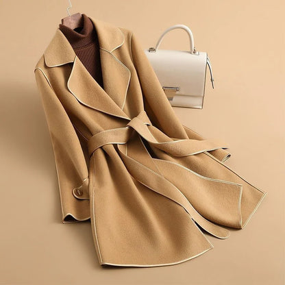 Jack Hafford Jennie Trench Coat in classic beige, featuring a tailored fit, double-breasted design, and belt detail.