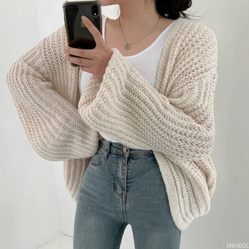 Homixa women's chunky-knit cardigan, soft and cozy, shown in a relaxed fit with textured knit pattern on a neutral background.