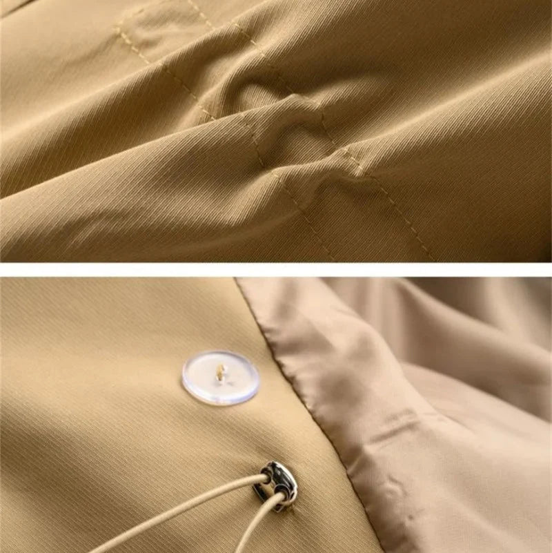 Sweet Emily trench coat by Jack Hafford hanging on a wooden hanger, showing its classic beige color and stylish design.