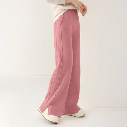 Kate and Wendy Isla tailored merino wool women's sweatpants, shown in a cozy, fitted design with a neutral color, front view.