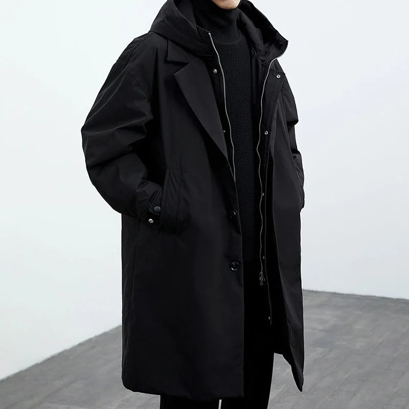 Darnell trench coat by Jack Hafford, beige waterproof outerwear with classic collar and button details displayed on a hanger.