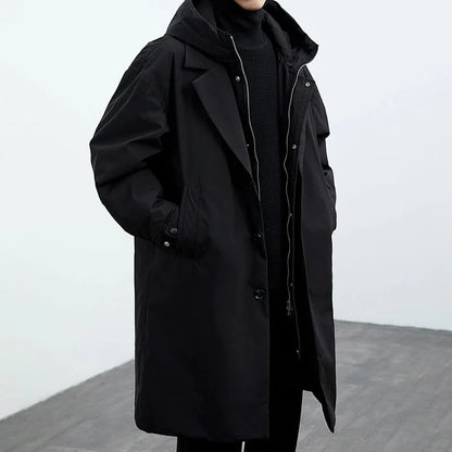 Darnell trench coat by Jack Hafford, beige waterproof outerwear with classic collar and button details displayed on a hanger.