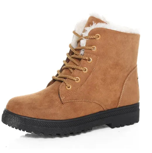 Homixa women's snow boots from the Blake Edit collection, featuring insulated winter footwear with sturdy soles and stylish design.