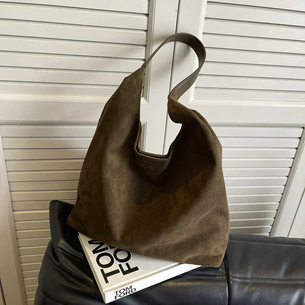 Homixa Women's tote bag with pocket detail, stylish and functional tote bag for everyday use, featuring a sleek design and spacious interior.