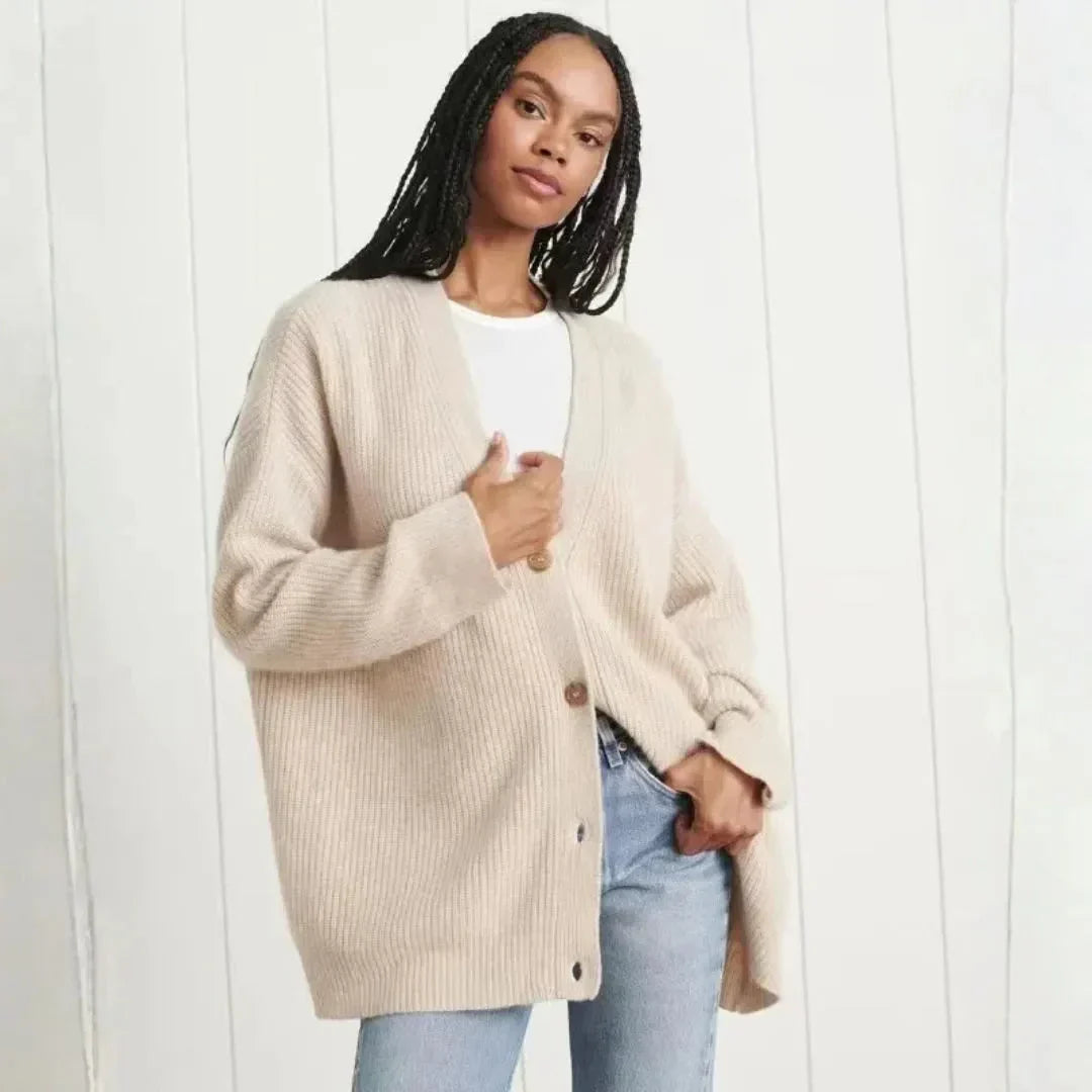 Women's olive green oversized longline ribbed cardigan with deep V-neckline and button front, stylish and cozy knitwear.