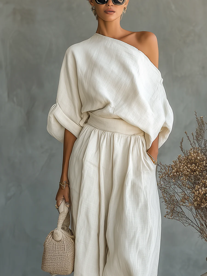 Off-white linen off-shoulder casual top and tapered pants set by gfhj, featuring loose fit and comfortable style.