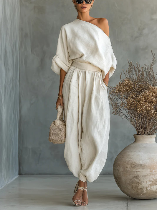 Off-white linen off-shoulder casual top and tapered pants set by gfhj, featuring a loose fit and relaxed style.