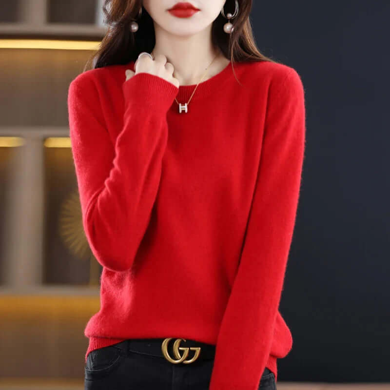Homixa Belvia women's fine-knit crew-neck sweater with ribbed cuffs and solid color finish, shown in a neutral tone.