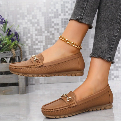 Homixa solid-color moccasins loafers with a heart ornament, showcasing a stylish and comfortable slip-on design.
