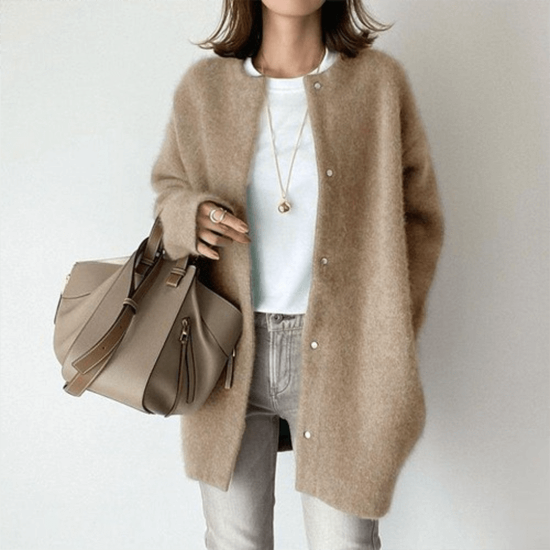 Women's elegant knit cardigan by Lunirel, featuring a cozy, stylish design with a button-up front and long sleeves.