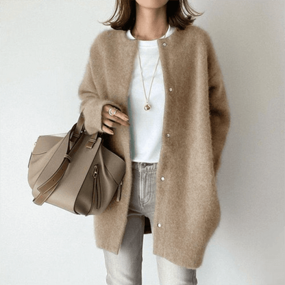 Women's elegant knit cardigan by Lunirel, featuring a cozy, stylish design with a button-up front and long sleeves.