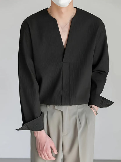 Homixa men's solid color V-neck long sleeve Henley shirt displayed on a model, showcasing a classic casual style and comfortable fit.