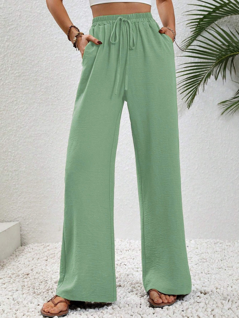 Dobrina draped wide-leg tailored trousers for women by Kate and Wendy, featuring a relaxed fit and sophisticated design.