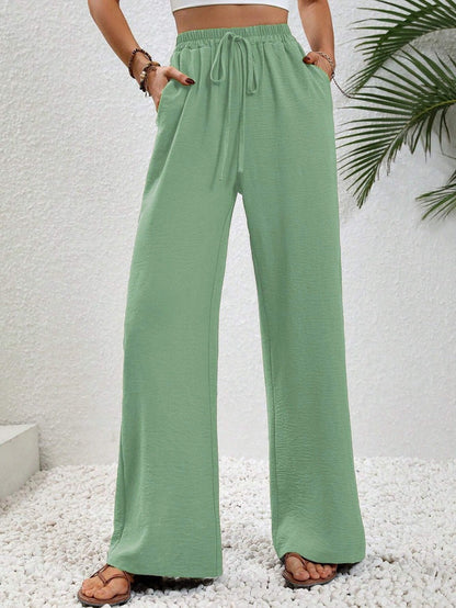Dobrina draped wide-leg tailored trousers for women by Kate and Wendy, featuring a relaxed fit and sophisticated design.