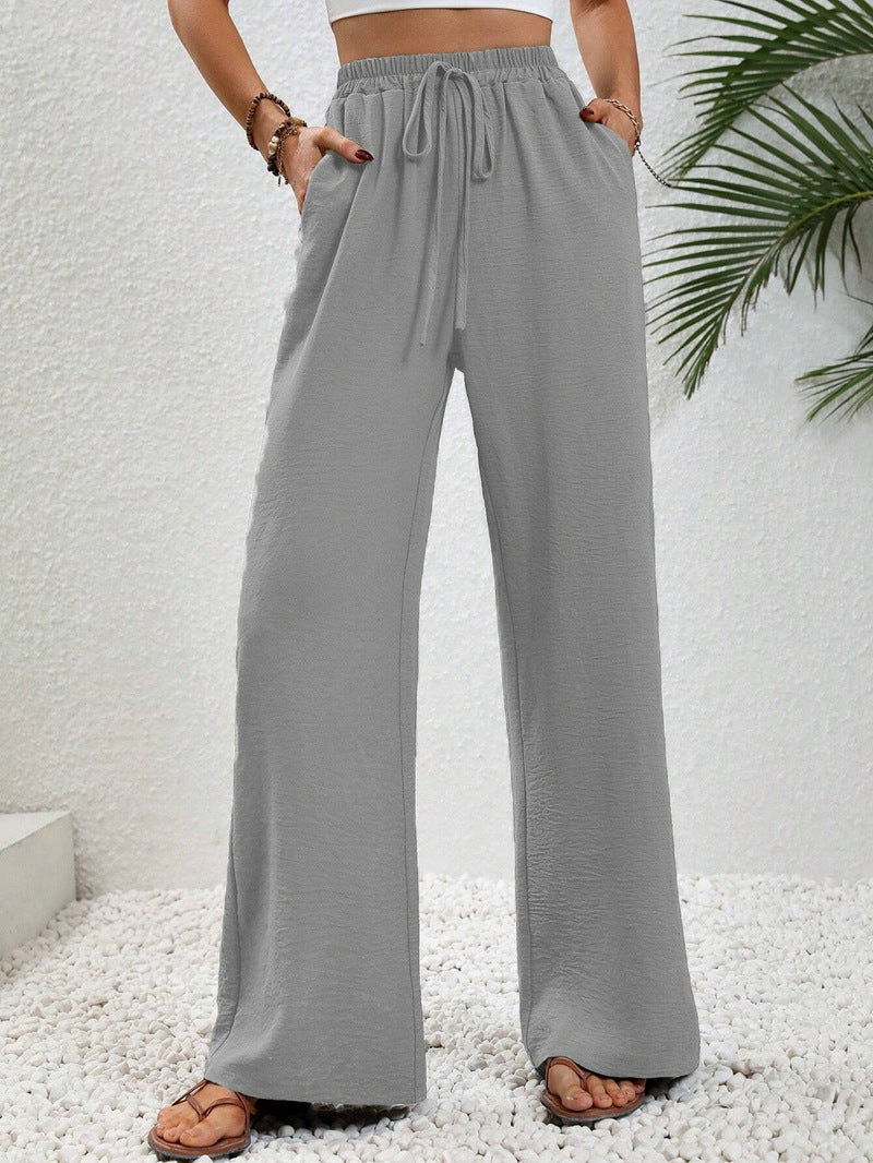 Dobrina wide-leg tailored women's trousers by Kate and Wendy, draped style, featuring a relaxed fit and elegant design.