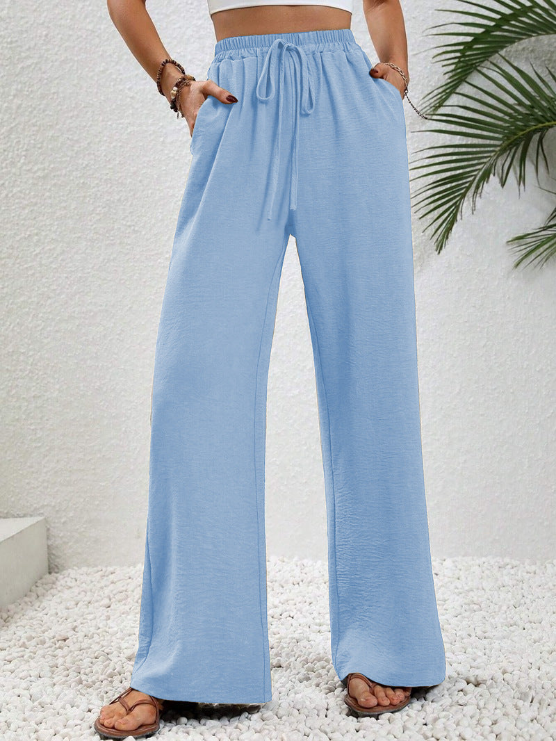 Dobrina wide-leg tailored women's trousers by Kate and Wendy, draped design, high waist, and relaxed fit.