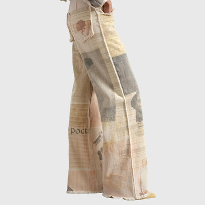 Homixa Alma women's vintage collage-print wide-leg jeans with frayed hems and high waist, showcasing a stylish denim design.