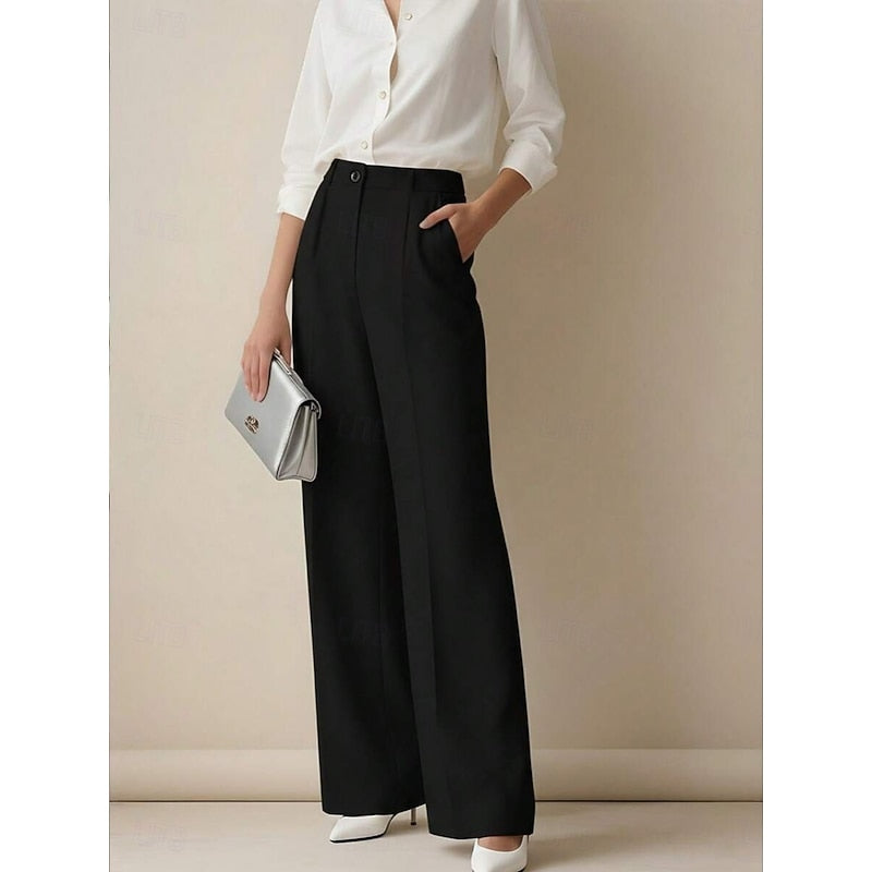 Harper & Wells Odette high-waist tailored trousers, stylish pants with a sleek fit, shown in a professional setting.