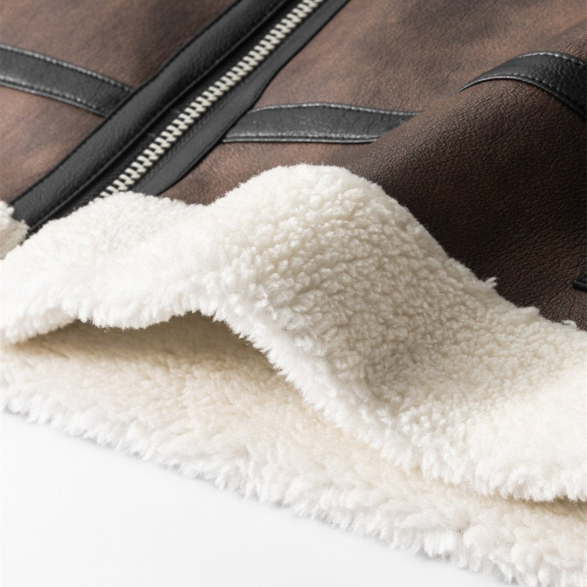 Close-up of a brown Travis Leather Jacket by Jack Hafford, showing detailed stitching and smooth leather texture.