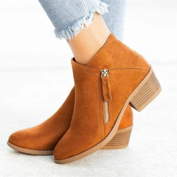 Homixa women's ankle boots from the Harper Edit featuring sleek black leather and stylish low block heel.
