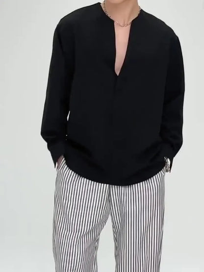 Men's solid color V-neck long sleeve Henley shirt by Homixa, displayed on a model showcasing the comfortable fit and classic style.
