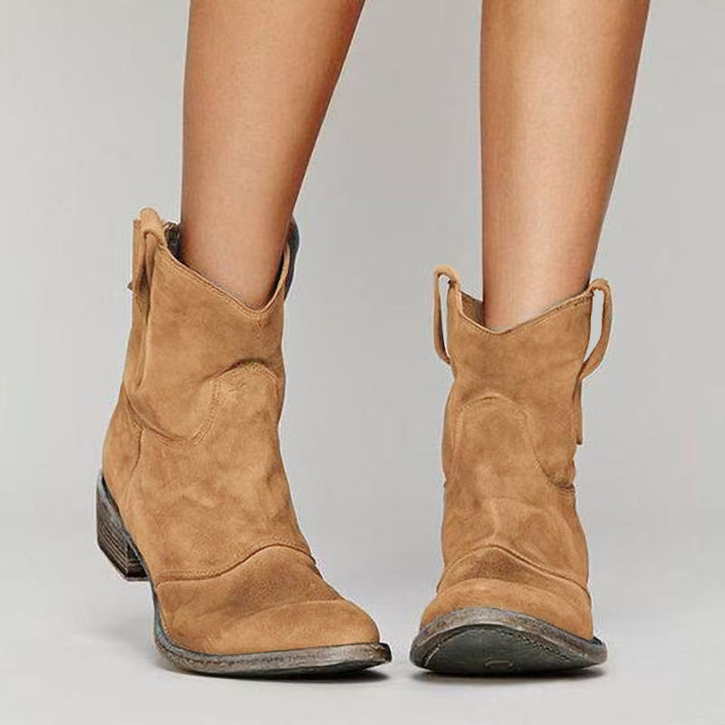 Homixa women's cowboy boots showcasing classic leather design with decorative stitching and pointed toes.