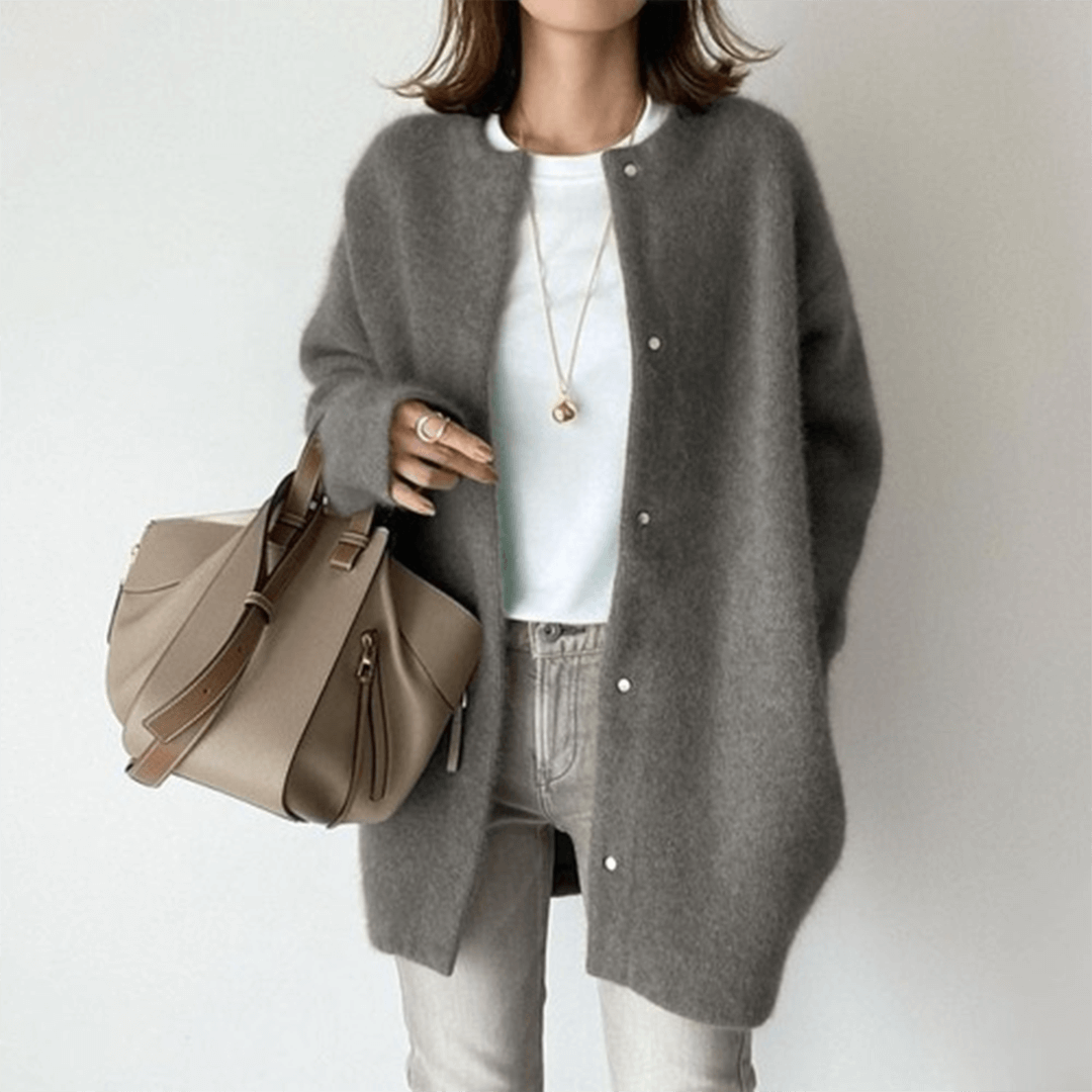 Women's elegant knit cardigan by Lunirel featuring a cozy, stylish design with a front button closure and long sleeves.