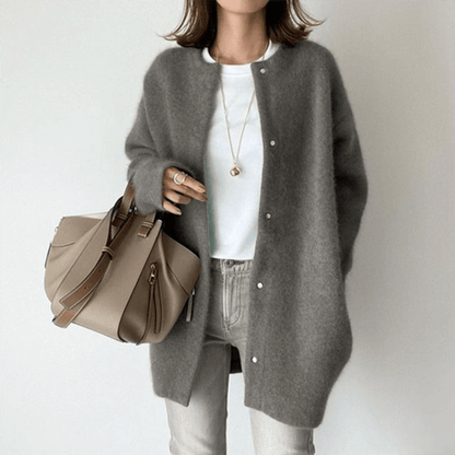 Women's elegant knit cardigan by Lunirel featuring a cozy, stylish design with a front button closure and long sleeves.
